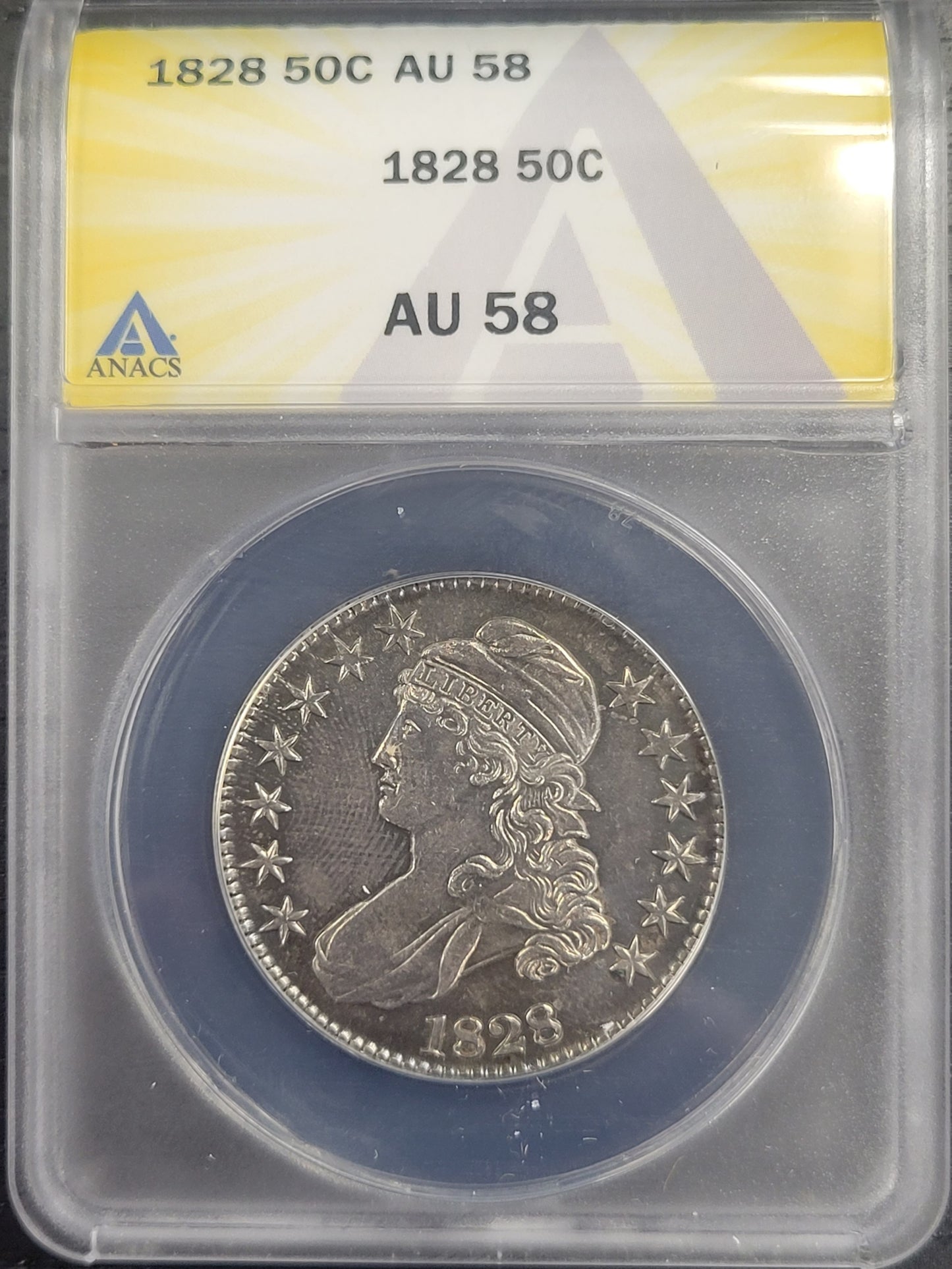 1828 Capped Lady Liberty 50c ANACS certified AU58