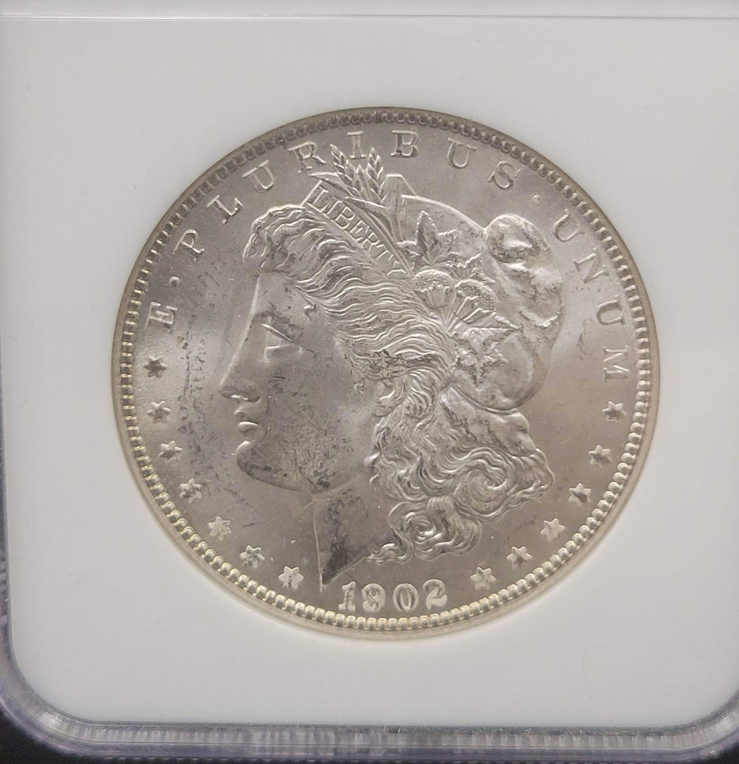 1902-O Morgan Silver Dollar NGC MS64 certified $1